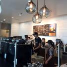 Employees prepare a drink at the ARC Peet's.