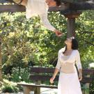 Photo: Romeo (Ian Walters) and Juliet (Gia Battista), during rehearsal in the arboretum's gazebo