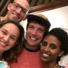 Selfie: four people smiling