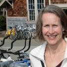 Susan Handy, woman by bicycles