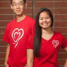 Photo: Two students model UC Davis Wears Red Day T-shirts.
