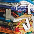 Photo: Detail of tower of blankets by Marie Watt