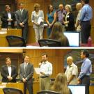 Photo: UC Davis representatives and Davis City Council members standing in front of the council dais.