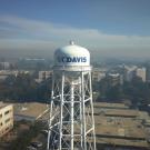 Smoke over the campus, main "UC Davis" water tower in foreground.