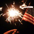 Sparkler and American flag.