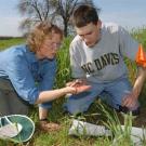 Photo: woman on grass talking