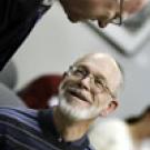 Plant biologist Terry Murphy asks Chancellor Larry Vanderhoef about W-2 tax filings involving campus employees.