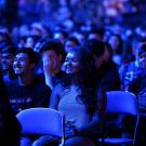 A crowd of students watches Fall Welcome.