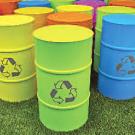 Photo: barrels with recycle symbol