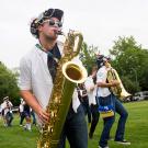 The Cal Aggie Marching Band-uh! plays on Russell Field.