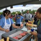 A UC Davis staffer gets an ice cream cone at the Thank Goodness for Staff picnic event.