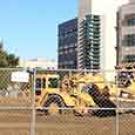 Tractor builds road in front of Vet Med 3B.