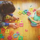 Picture of adult playing with child