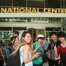 Students talk in front of the International Center at UC Davis