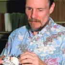 Photo: man holding shell