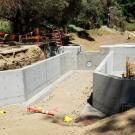 Concrete weir in dry waterway