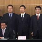 Photo: Ralph J. Hexter signs memorandum of understanding.