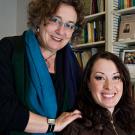 Photo: Diane Wolf, left, standing, with hand on Brandy Jenkins' shoulder.