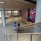 3 students at the botton of a staircase at Aggie Square
