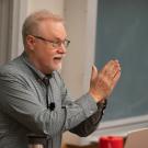 Man in front of classroom