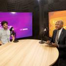 Miguel Craven sitting next to Chancellor May