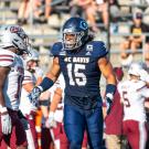 Teddye Buchanan with the UC Davis football team
