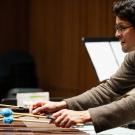 A man plays a percussive instrument