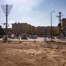 empty field with partial city behind it in Israel.