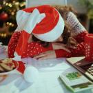 Woman in red sweater sleeping 