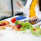 bowls of fruits and vegetables with a dietitian 