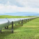 Pipeline in green valley