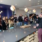 A dozen fellows from the UC Davis Innovation Institute For Food and Health listen to a speaker at an industry day event. (IIFH)