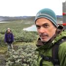 Eric Post takes selfie at his field site in Arctic Greenland, his daughter in the background
