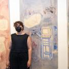 Gracianne Kirsch, a UC Davis Art Studio M.F.A. alum, with their work at the Arts & Humanities 2024 Graduate Exhibition held in the Jan Shrem and Maria Manetti Shrem Museum of Art. Kirsch won the inaugural Letters & Science Prize for Excellence. (Hung Q. Pham Photography)