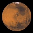 Red-brown planet with a small northern ice cap. 