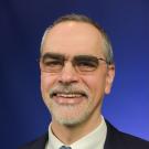 A portrait of faculty member Ramsey Badawi at UC Davis