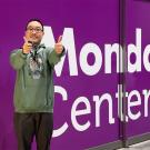 Man gives two thumbs up outside of the Mondavi Center at UC Davis