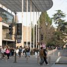 Students walk outside of the Mondavi Center at UC Davis