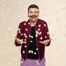 Joe Sasto throws puff chips in the air and laughs