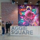 Interior photo of Aggie Square shows exposed brick
