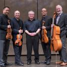 Alexander String Quarter with Robert Greenberg, in suits and holding instruments