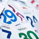 Photo shows calendar pages of many different dates