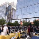 Crowd of people outside of Aggie Square building