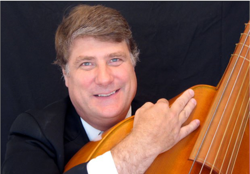 Steven Lehning holding a viola.